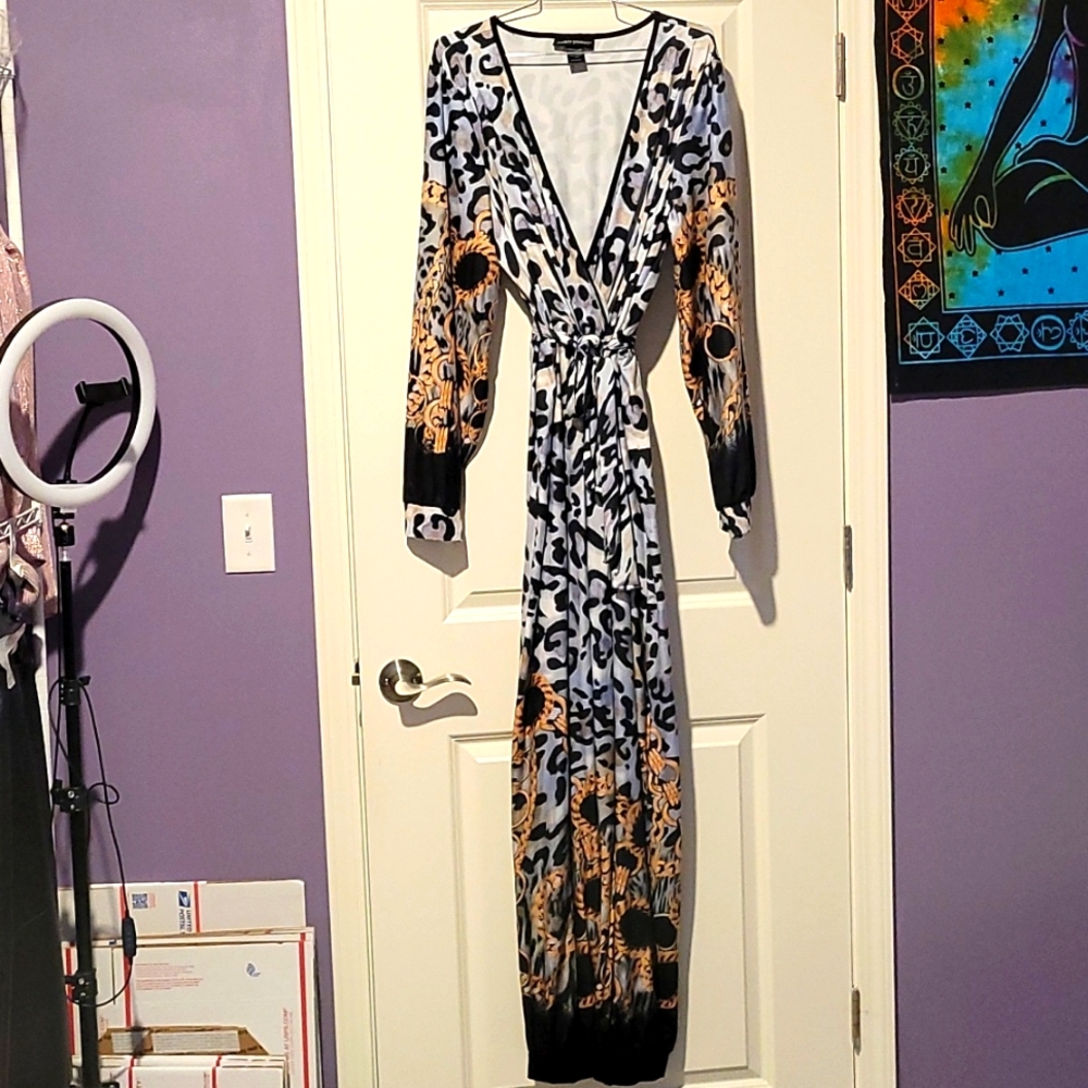 NWOT Woman's multi print v-neck crossover long sleeved belted jogger jumpsuit.